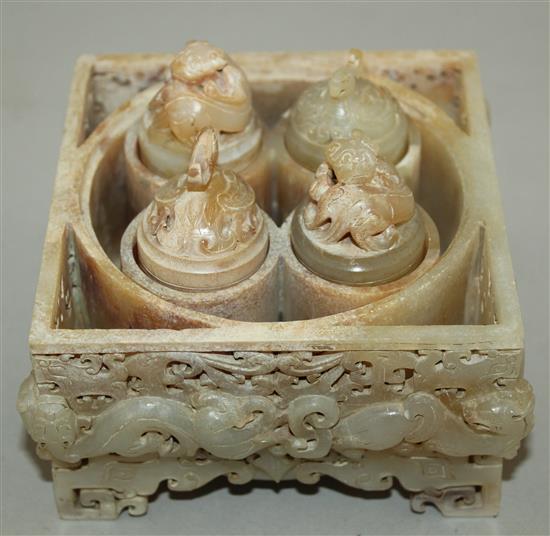 A Chinese archaistic burnt white and russet jade seal box and cover, width 12cm, height 14cm, wood stand